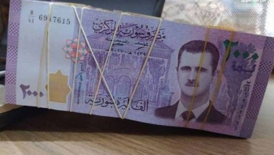 منحة مالية من رأس النظام السوري بقيمة لاتتجاوز 12 دولارا