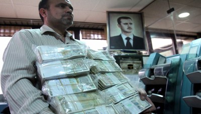 الليرة السورية تهوي إلى مستوى قياسي جديد أمام الدولار