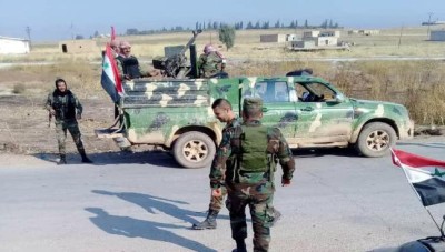 In an incident, the first...Civilians beating members of the regime in Al-Qalamoun