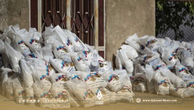 عبر المساعدات الغذائية.. القوات الروسية تزاحم النفوذ الإيراني في الميادين 