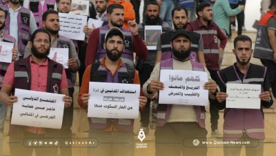 عمال الإغاثة في إدلب يظهرون تضامنهم مع غزة