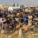 ارتفاع درجات الحرارة يفاقم معاناة المدنيين المهجرين في مخيمات شمال غرب سوريا